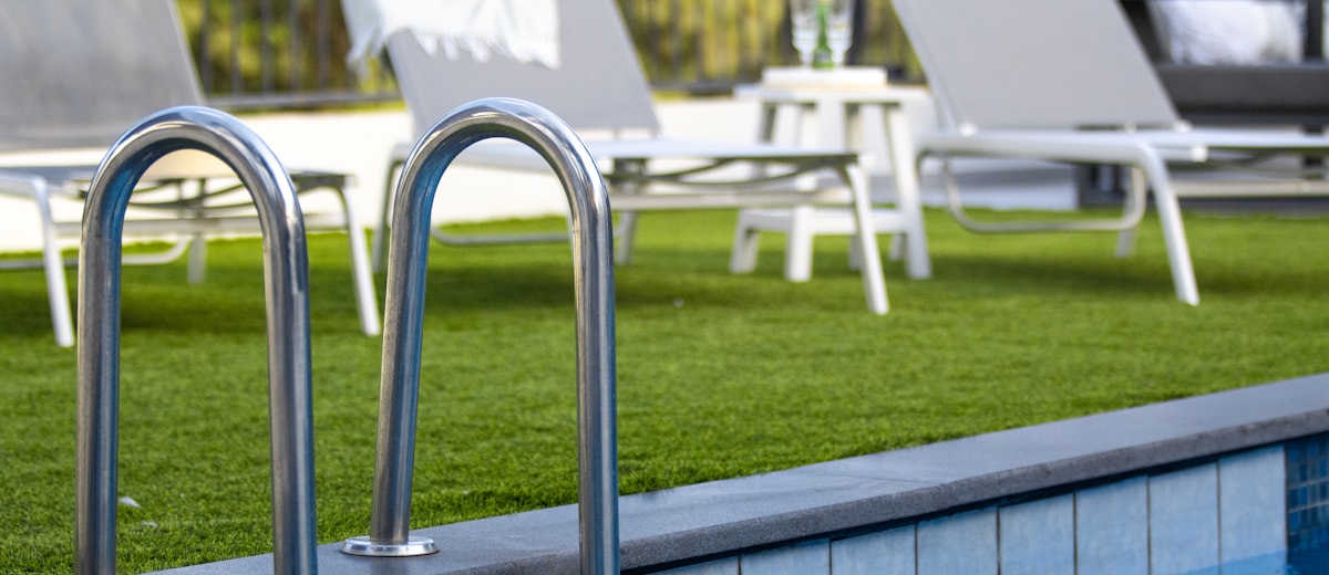 Backyard turf with pool — dog-friendly clean outdoor space