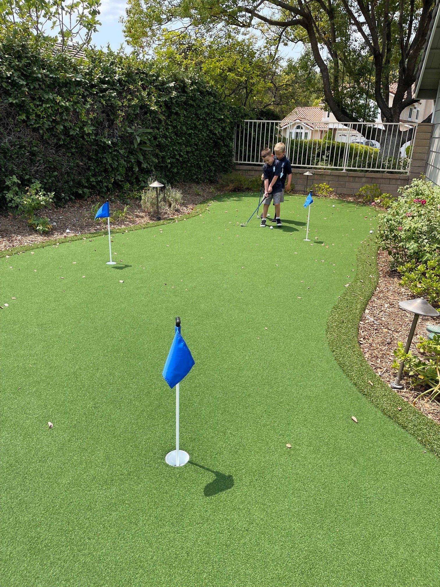 Artificial turf playground surface — school and park installation